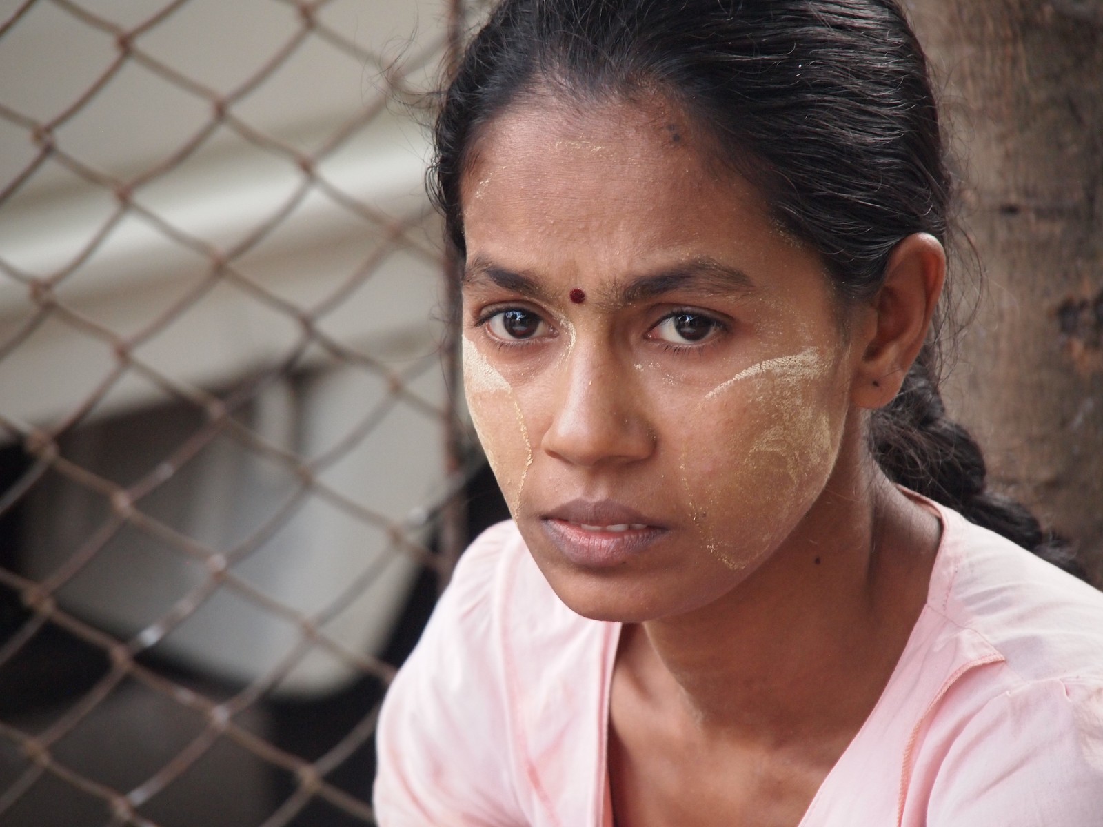 a close - up s of a woman looking at the camera