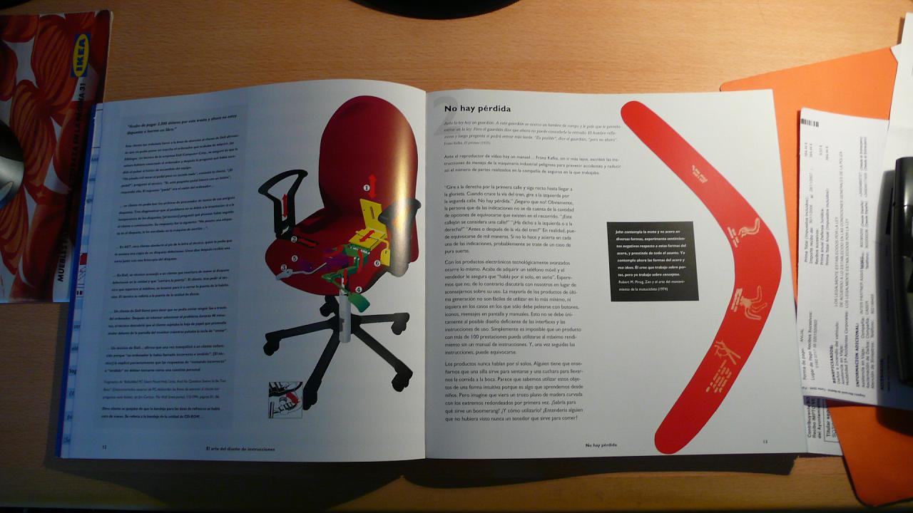 an open book with images of chairs and wheels