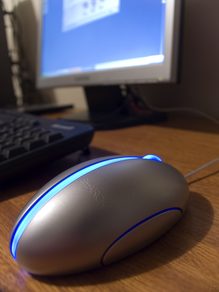 a computer mouse with an illuminated side
