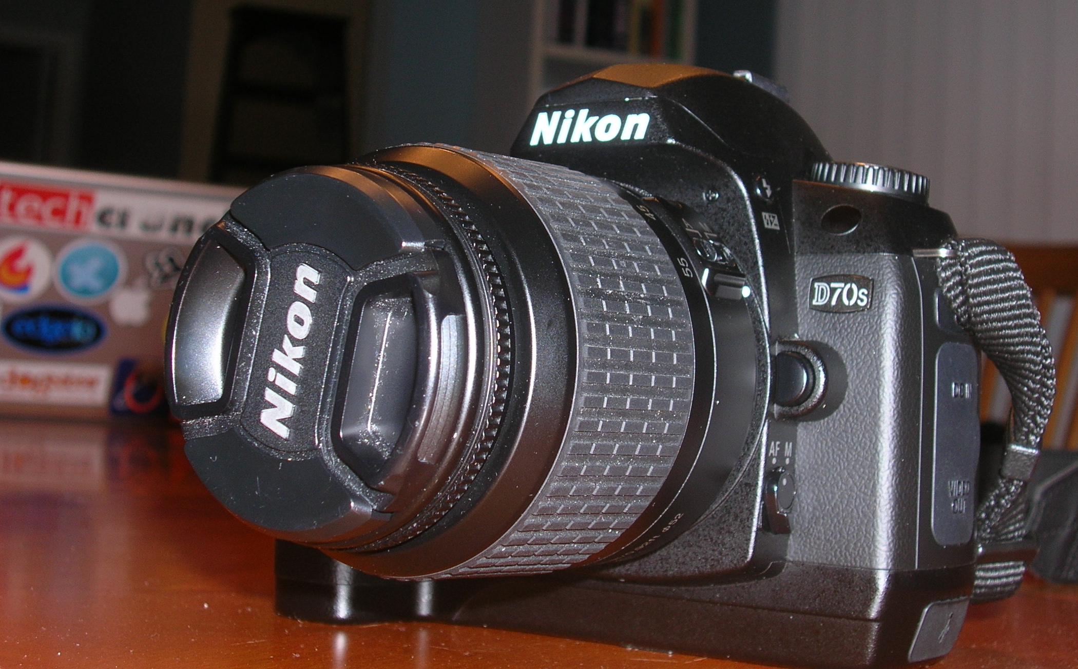 a nikon digital camera with its flash cap on