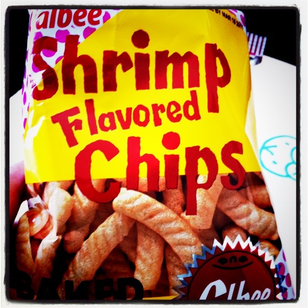 a bag of shrimp flavored chips sitting on top of a counter