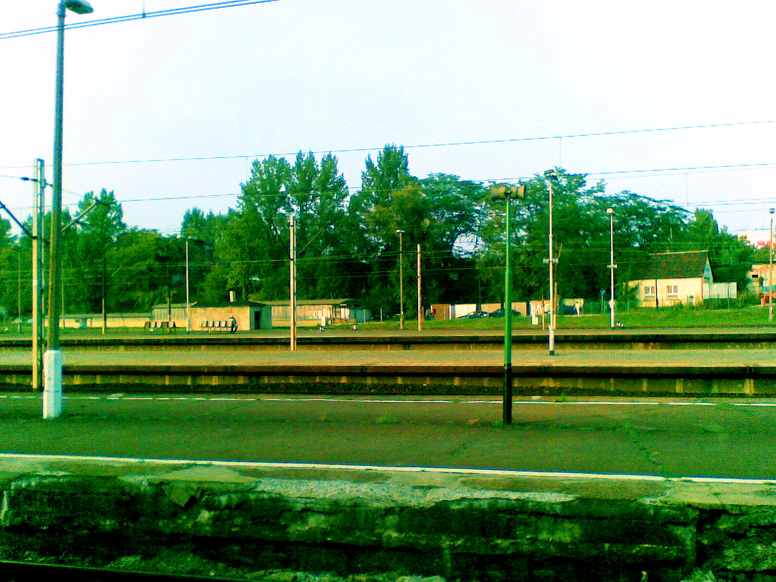 a street with a train going past by