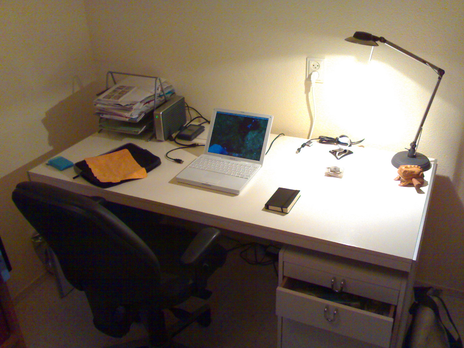 desk lamp and desk top computer on white table