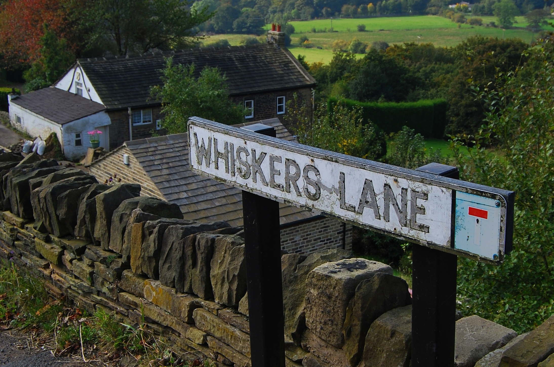 a sign that is on the side of a road