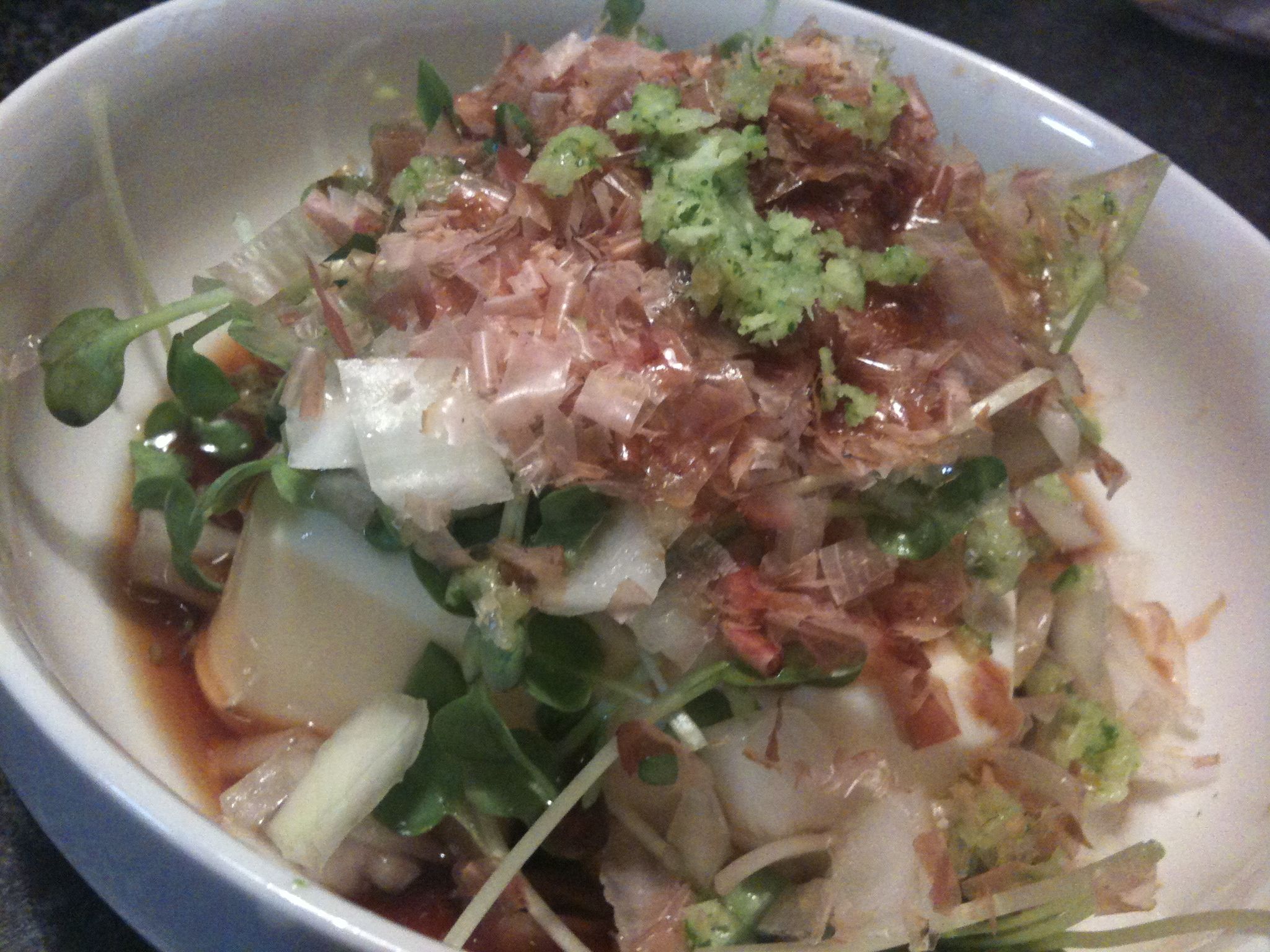 a white bowl filled with a variety of vegetables