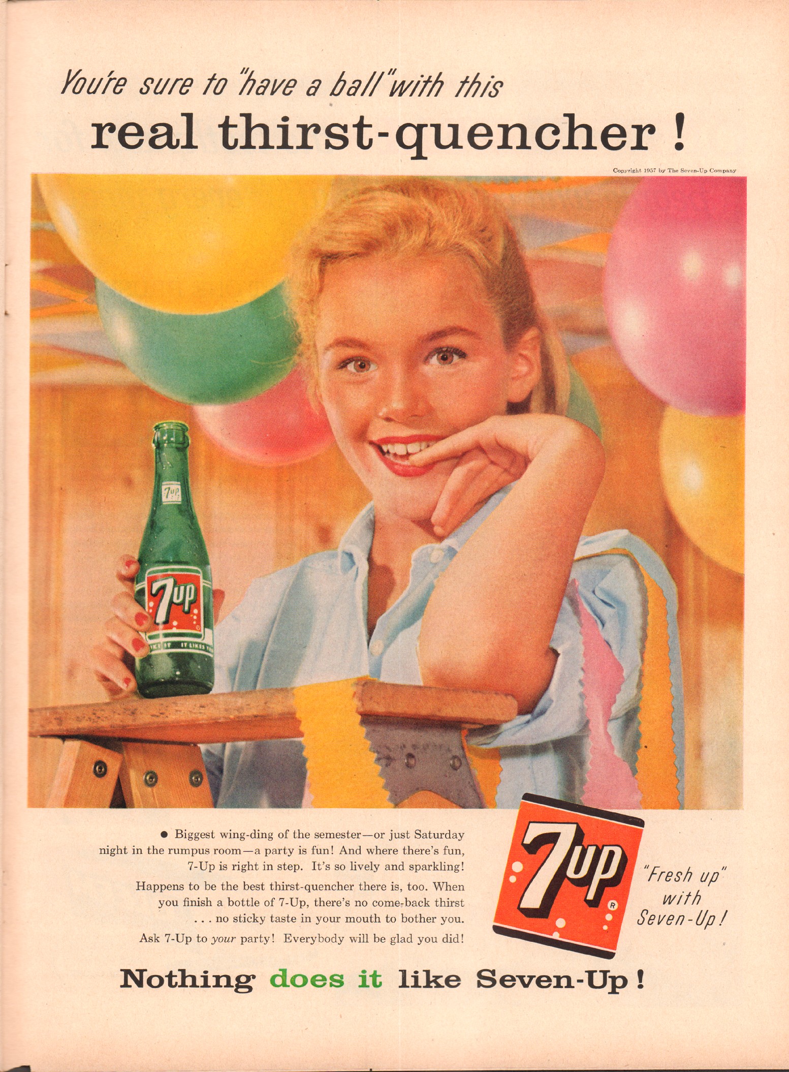 a woman holding up a bottle of 7up next to a boy