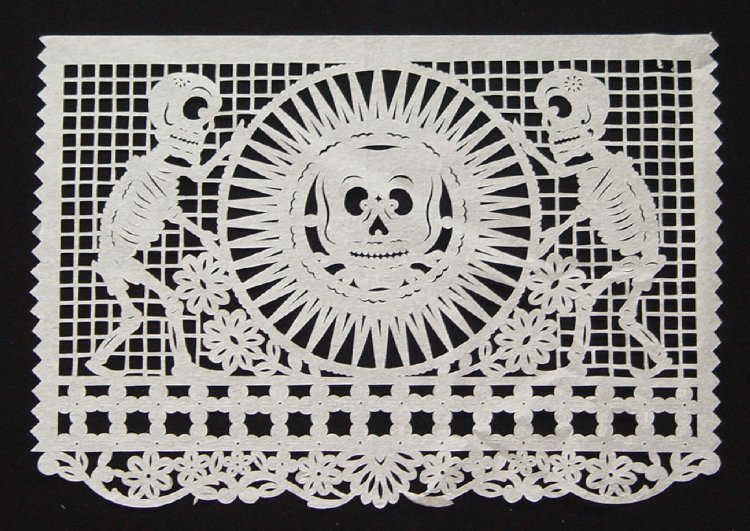 the paper with a skull and flower motif is shown