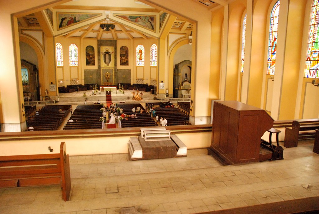 empty altars are seen with people standing on the side