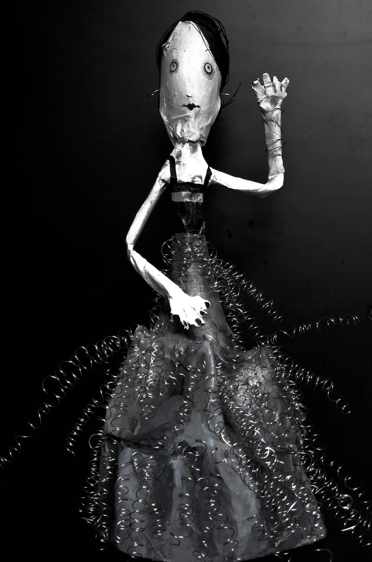 an image of a doll with a dress