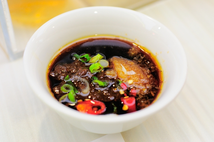 a bowl filled with lots of different types of soup