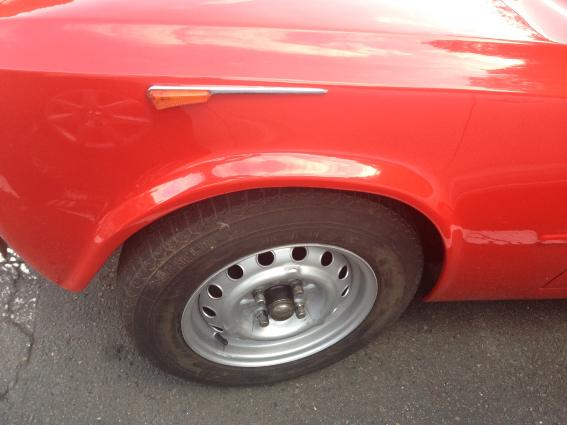 a close up of the wheel of a car