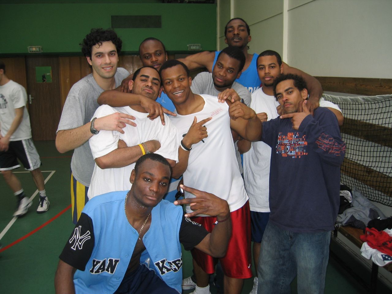 some very young guys posing with one another