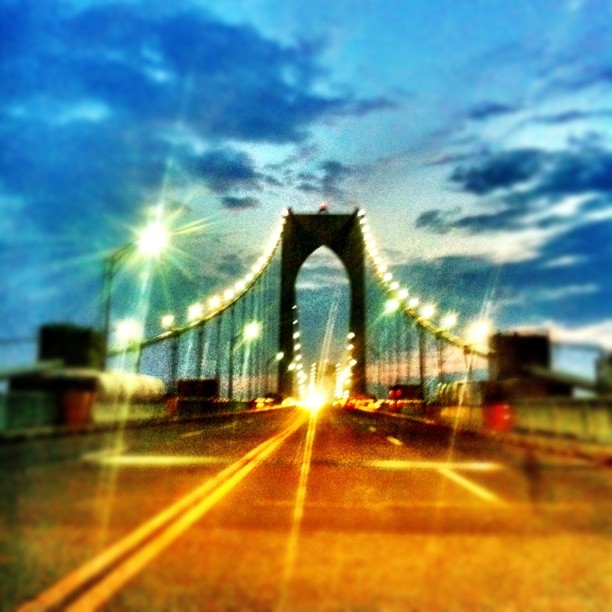a picture taken from a car looking at the bridge