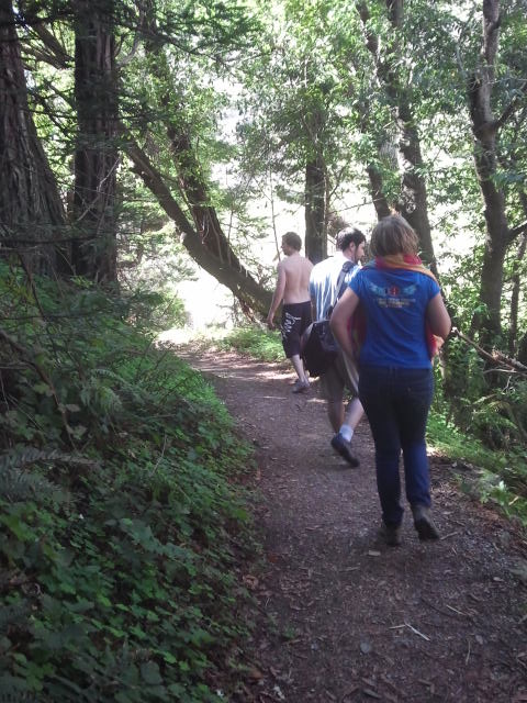 the trail is full of people and trees