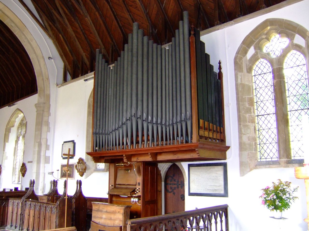 an old church has pipe organ sitting in the front