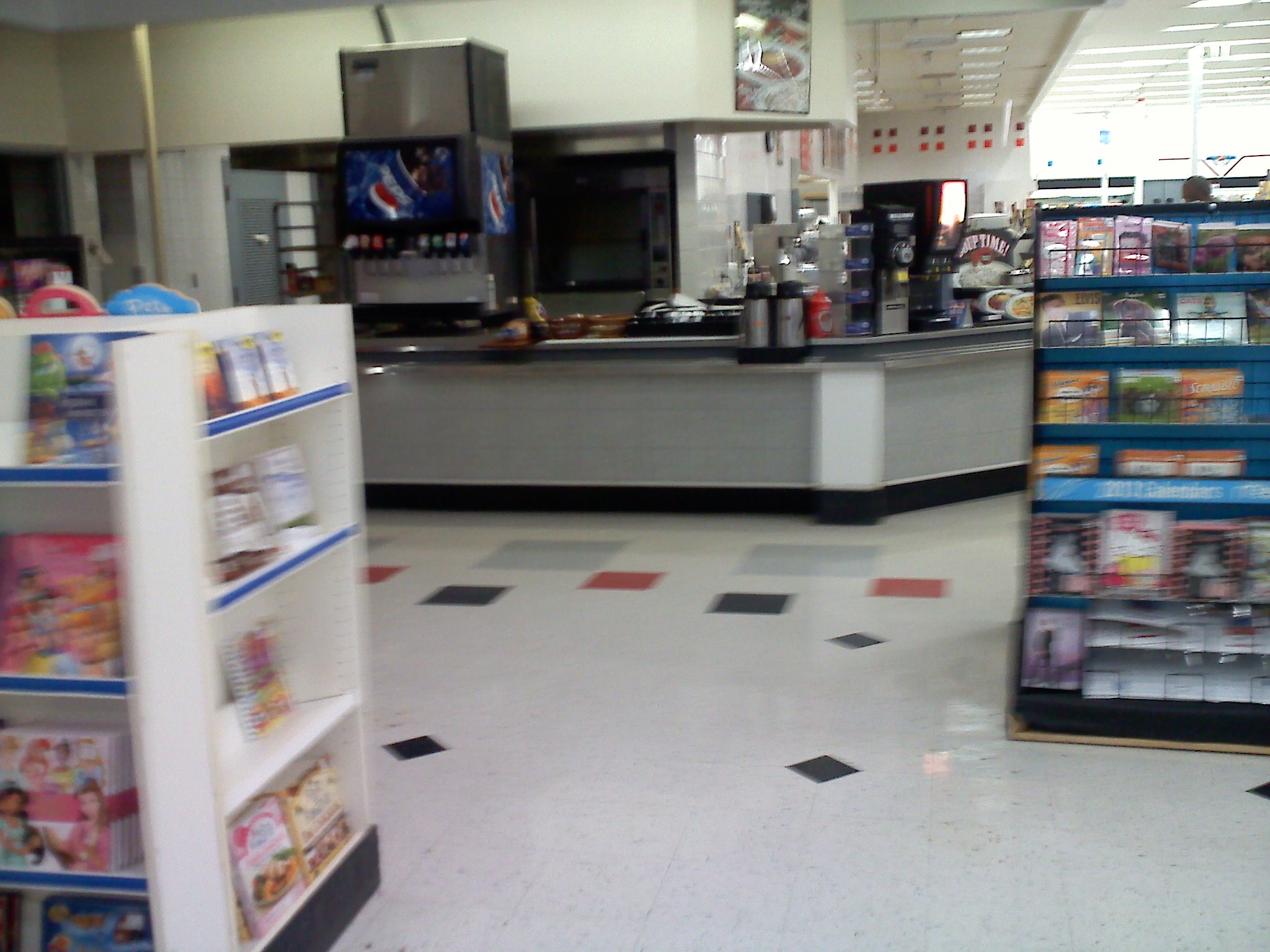 a grocery store with a checkered floor is pictured