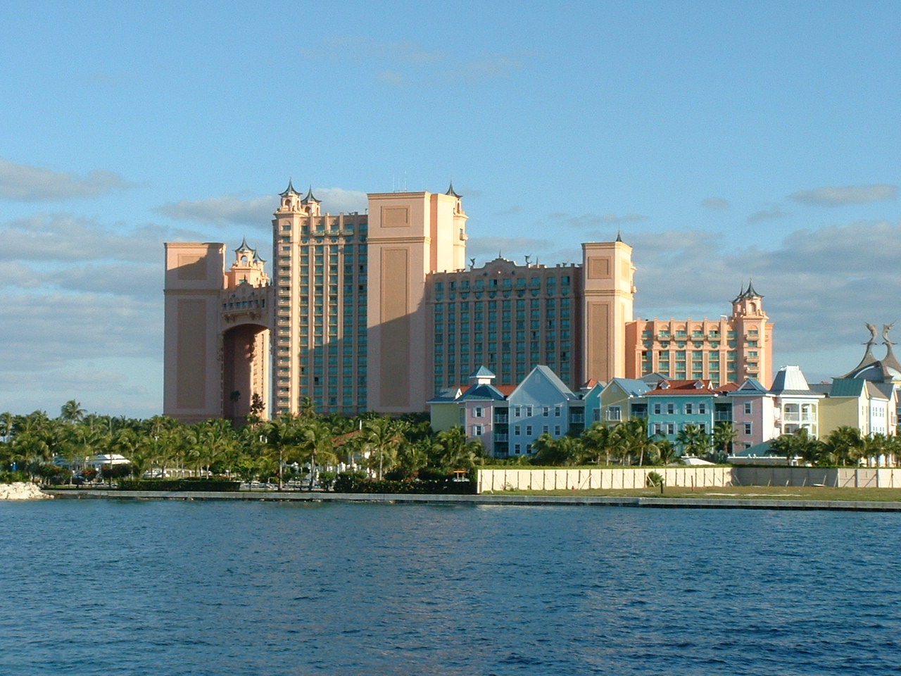 the waterfront of a city with water and several tall buildings