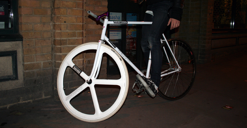 a bike wheel with spokes and spoke spokes attached to the front wheel