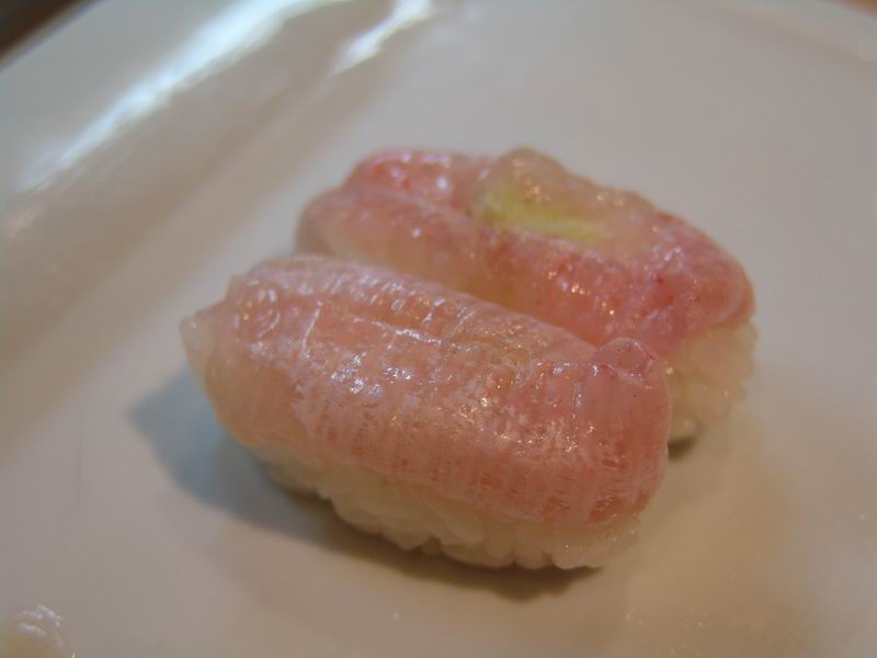 a couple of food items sitting on top of a white plate