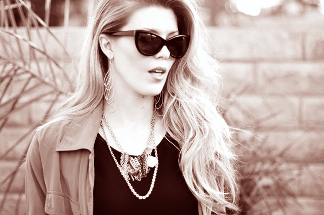 black and white pograph of blonde woman in sunglasses