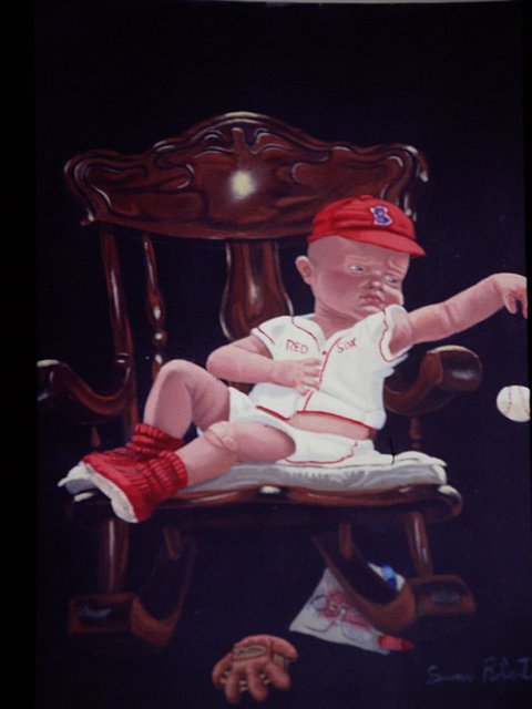 a po of a baby sitting in a chair