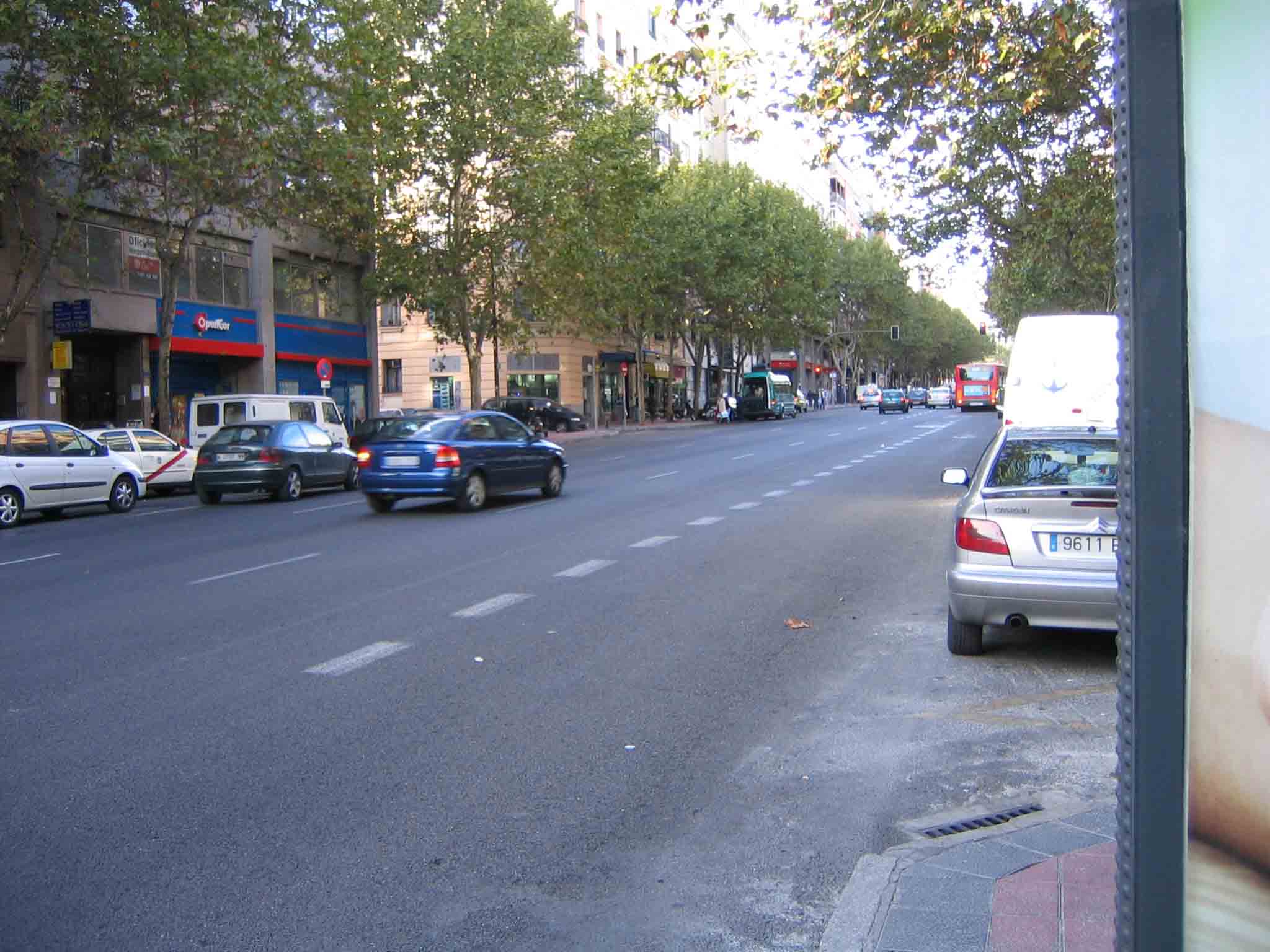 a city street filled with lots of traffic