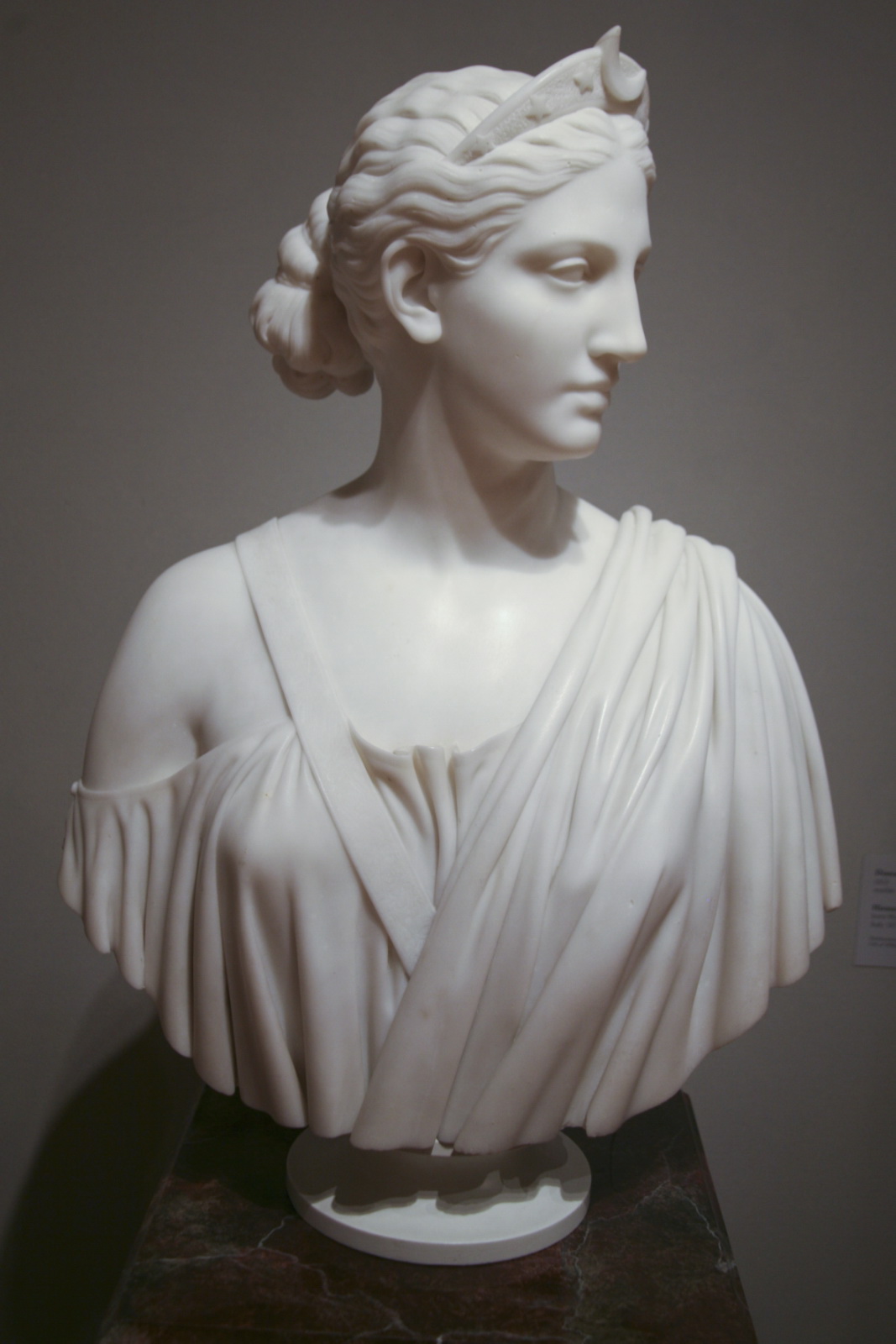 a statue of a woman in a white dress