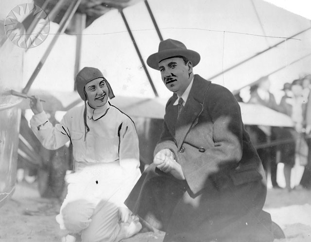 two old fashioned fashioned people in hats and suits