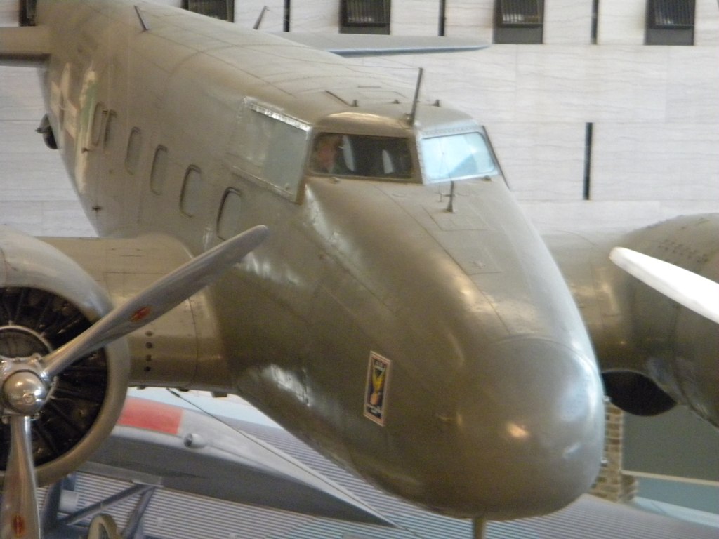 a big plane inside of a large hangar