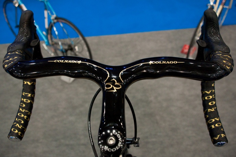 a close up view of a bicycle's handle bar and seatpost