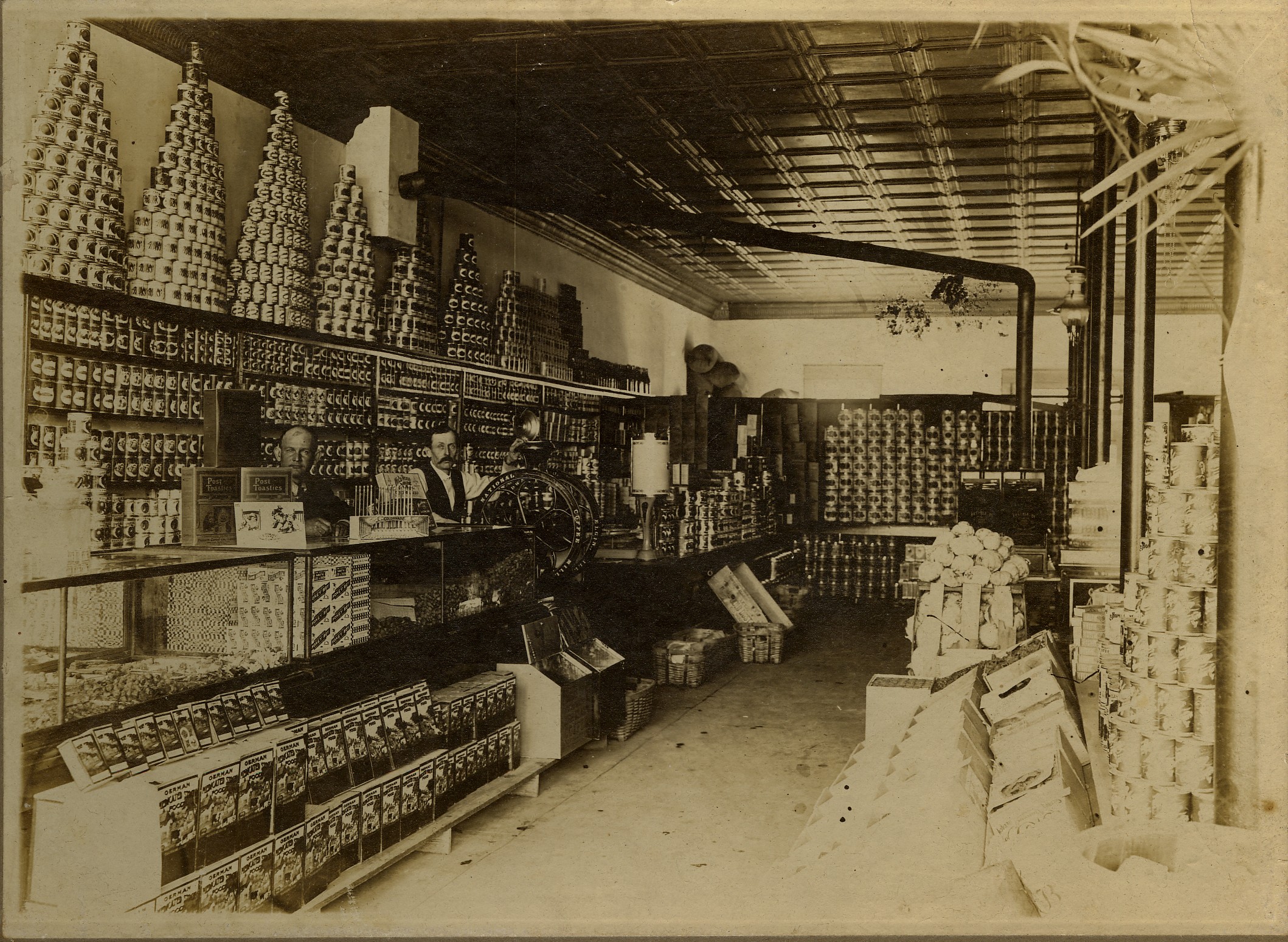 black and white pograph of store with several items in it