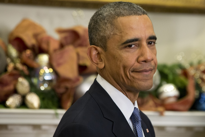 president barack obama looking at camera with focus on his head