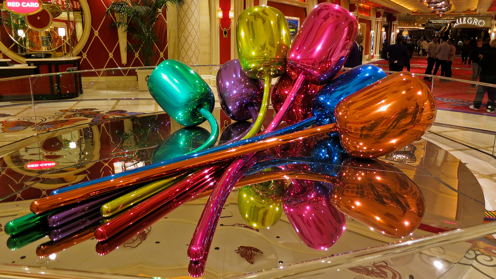 a bunch of balloon balloons sit on a large display