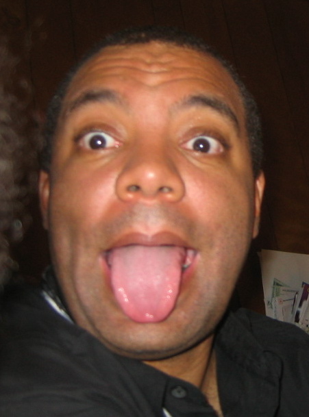 man with tongue out showing open top his tongue