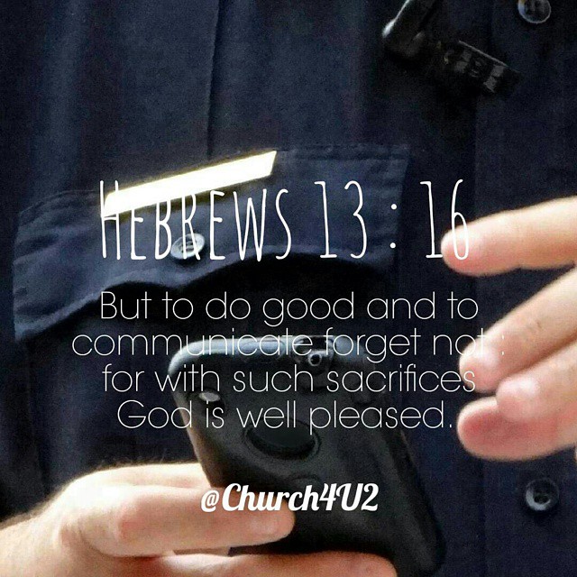 a police officer is showing his bible
