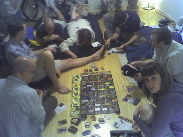 an image of people playing a board game