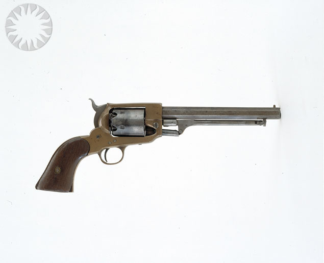 an old colt revolver with no sight in the barrel