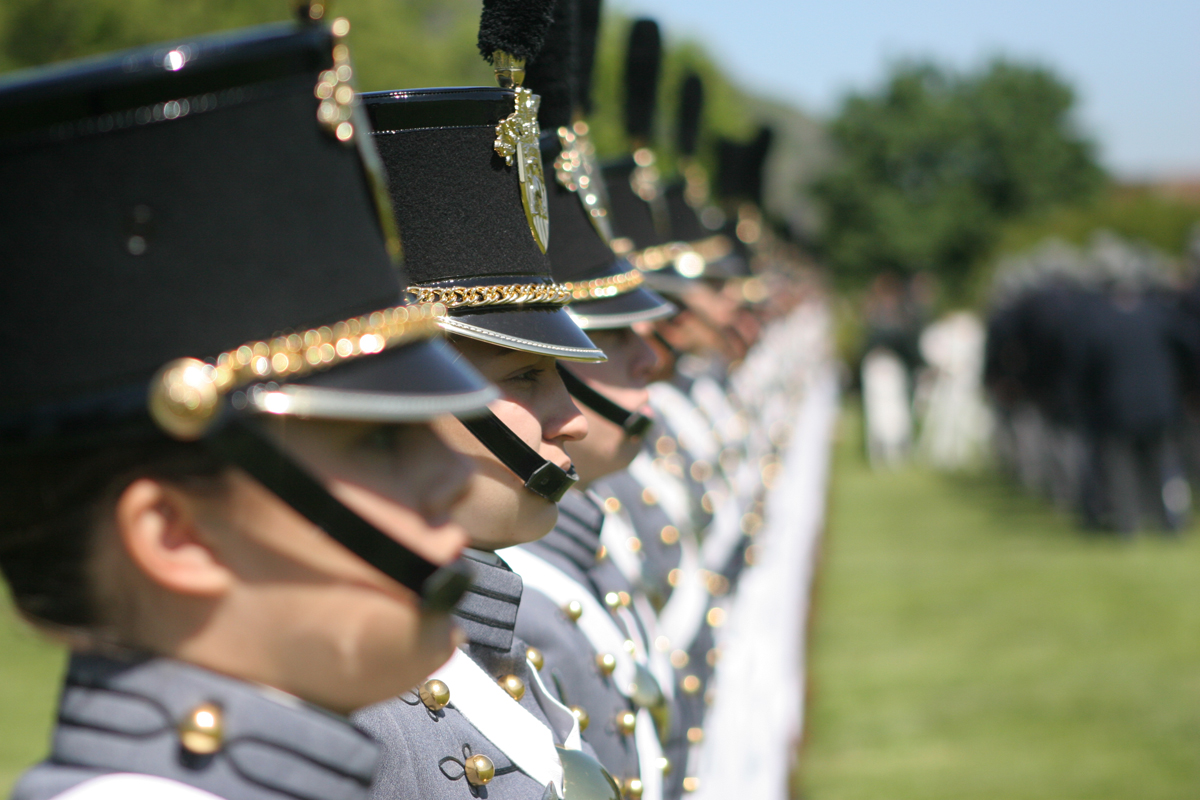 some military members are lined up with a uniform