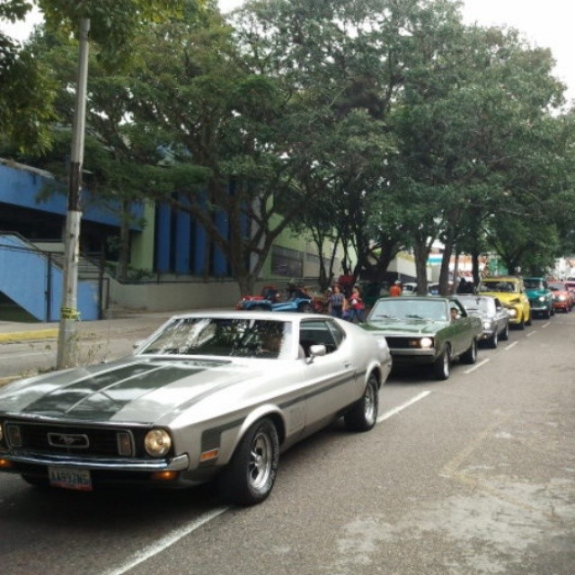 cars that are lined up on the street