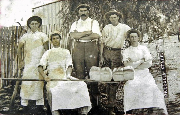 old time pograph of men and women holding buckets