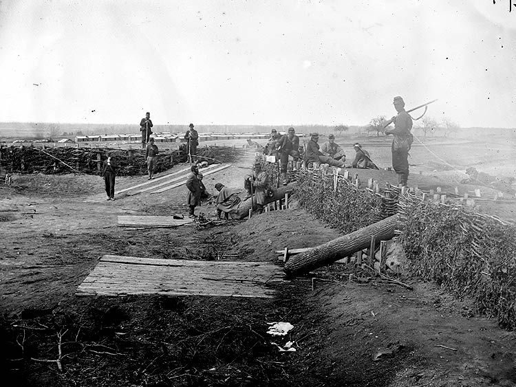 old time pograph of men in the middle of an area