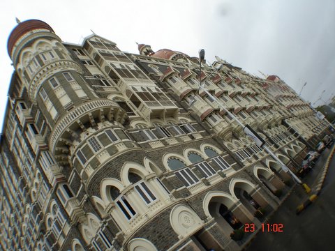 large building with an intricate balcony and arches