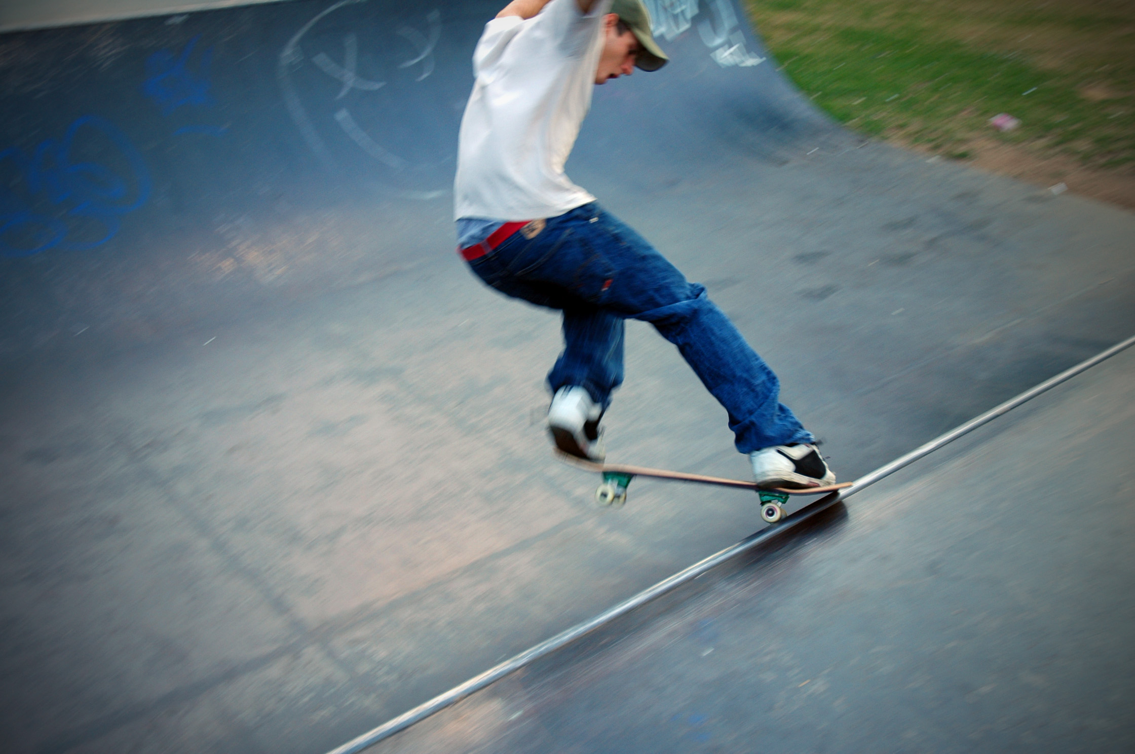 a man on a skate board doing tricks