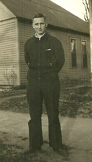 vintage pograph of a man in front of a church