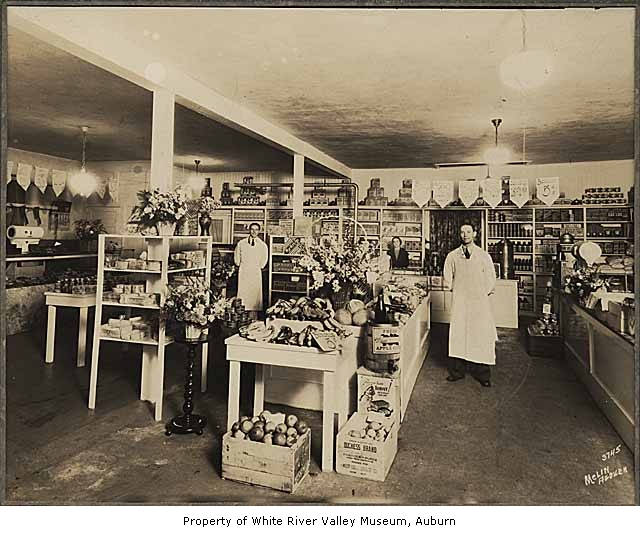 a black and white po shows two women standing in a pharmacy