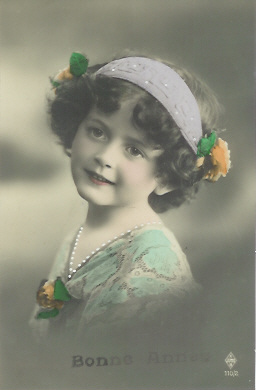 a vintage po of a woman with flower hair clips