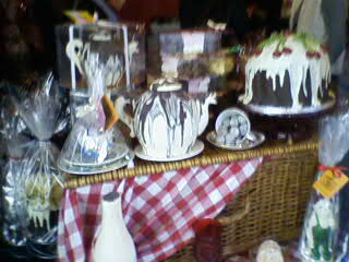 a large table filled with lots of different types of cakes
