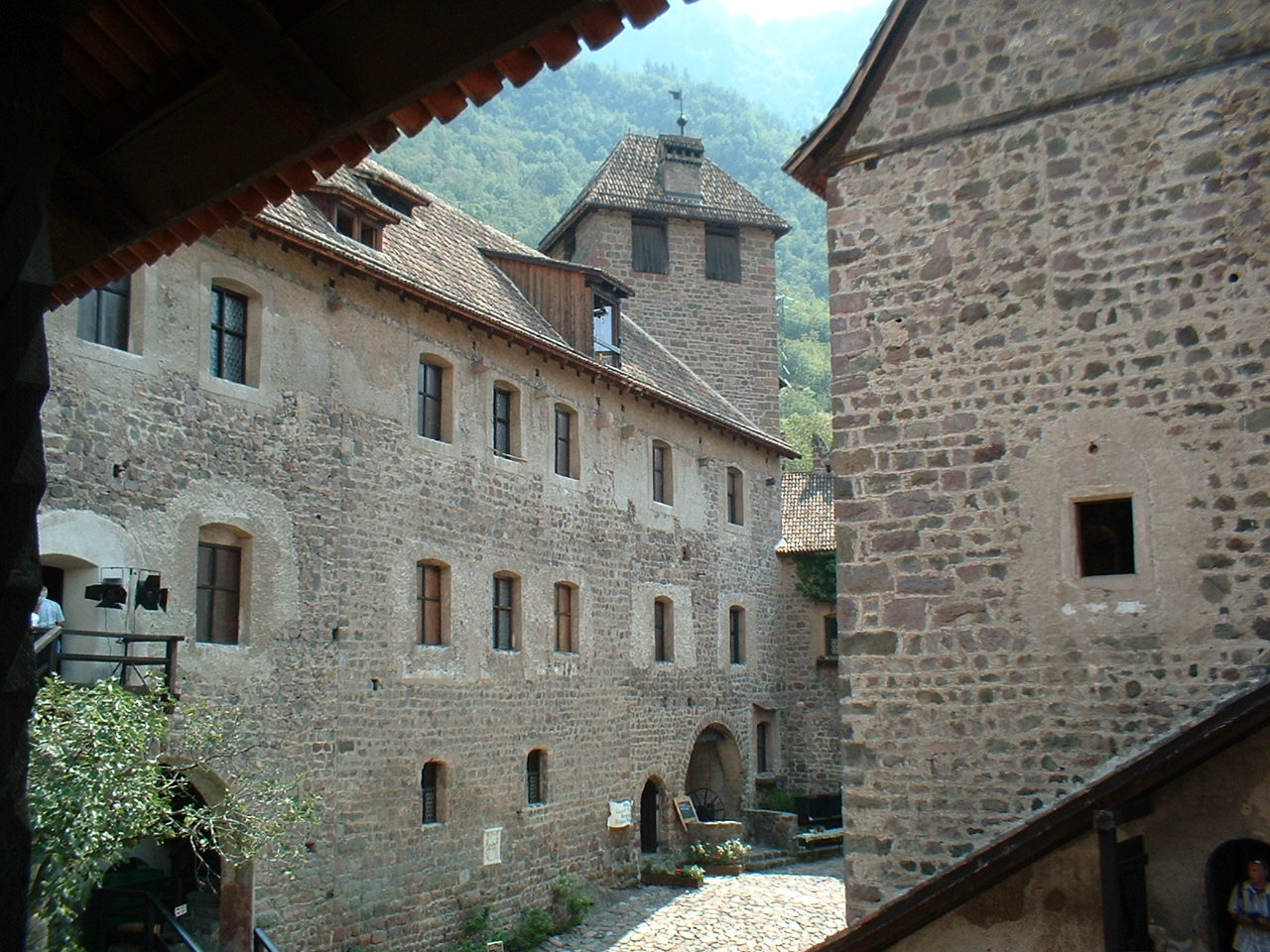 some very old buildings with stone and brick