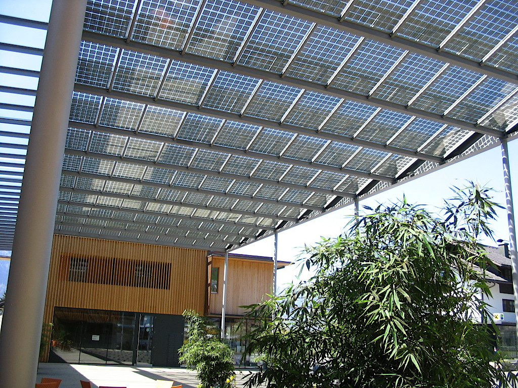 the inside of a building with a white roof