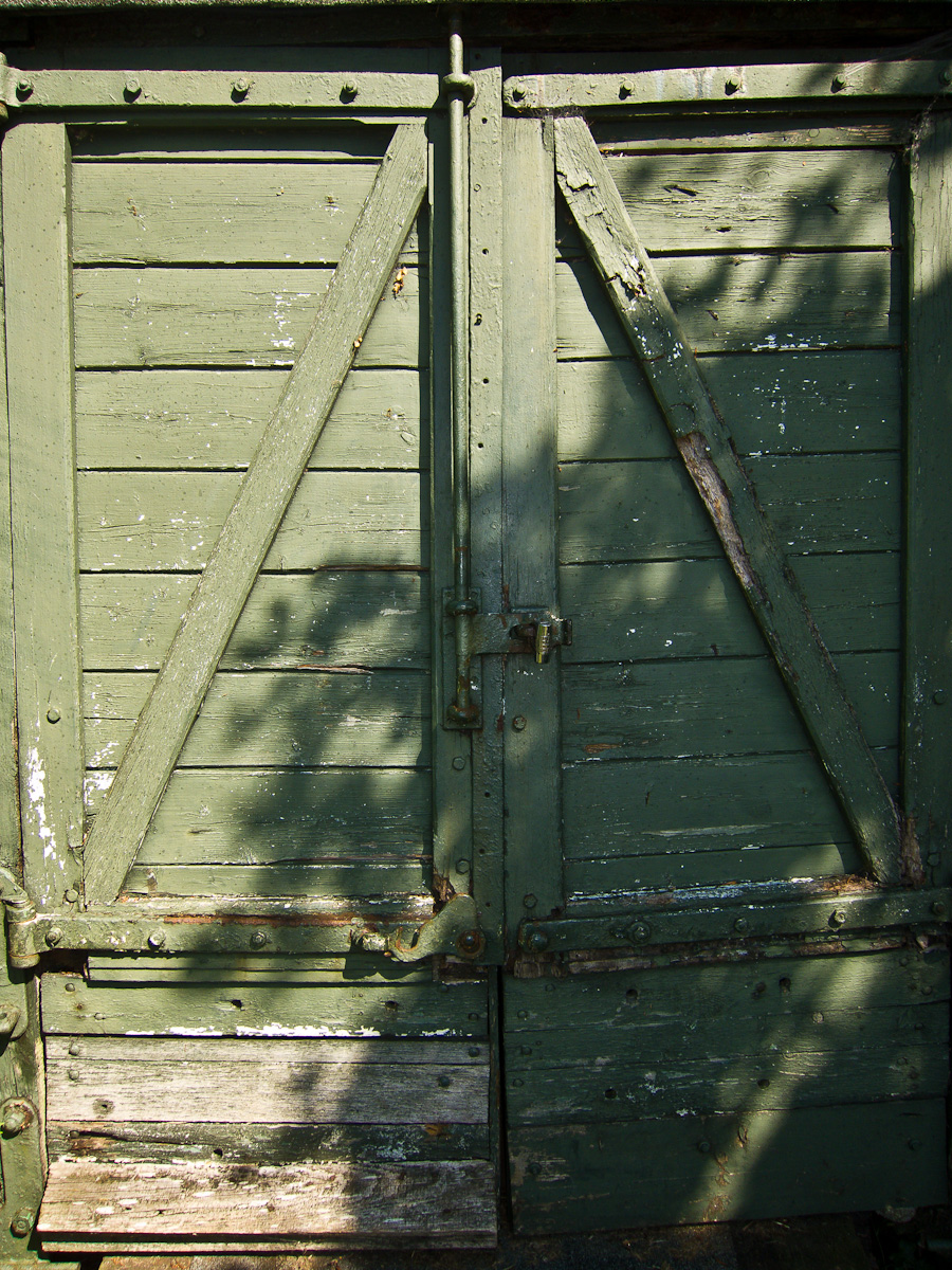 closed gates with latch on each side open in a park